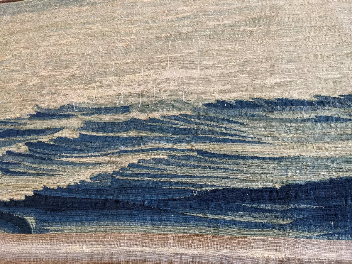 Blue crested waves woven on tapestry